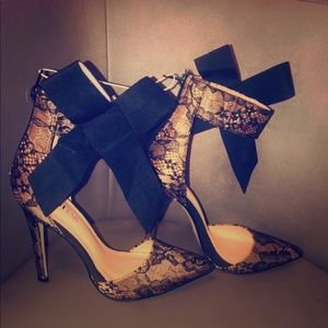 Side Bow Laced Heels by JustFab